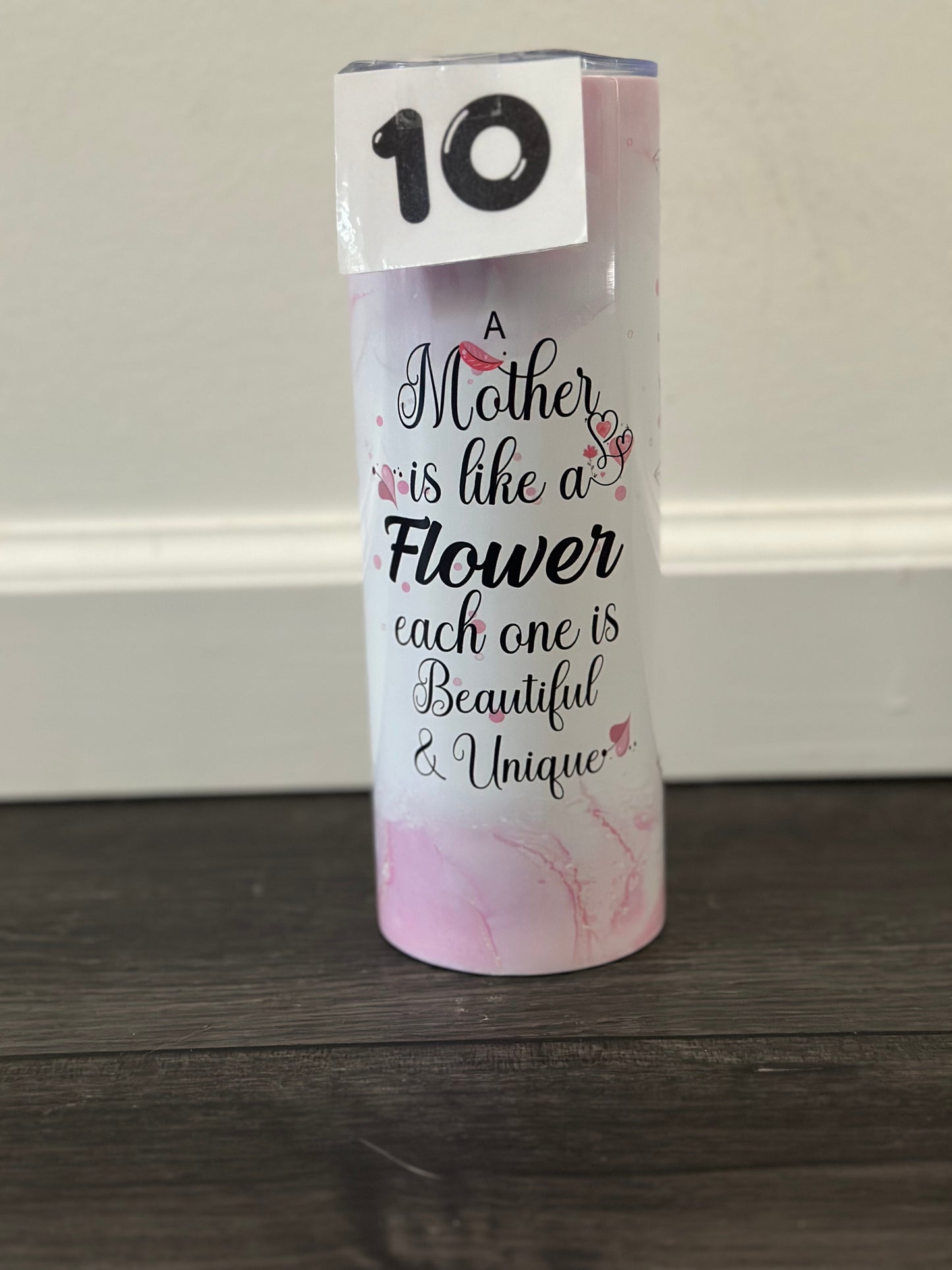 a mother is.. 20oz skinny tumbler
