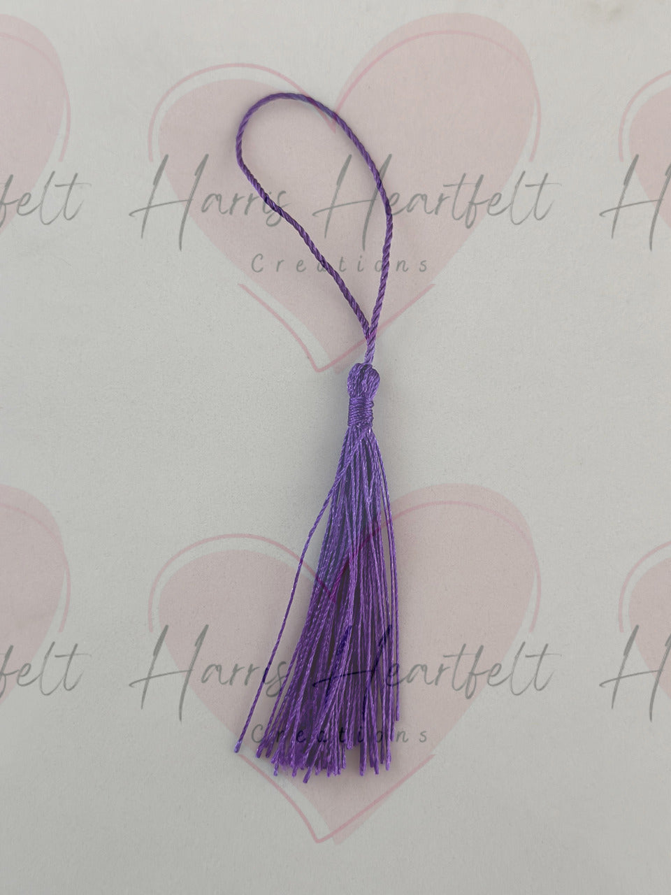 purple metal bookmark tassel