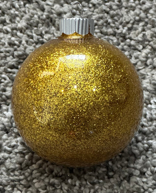 gold glittered plastic ornament