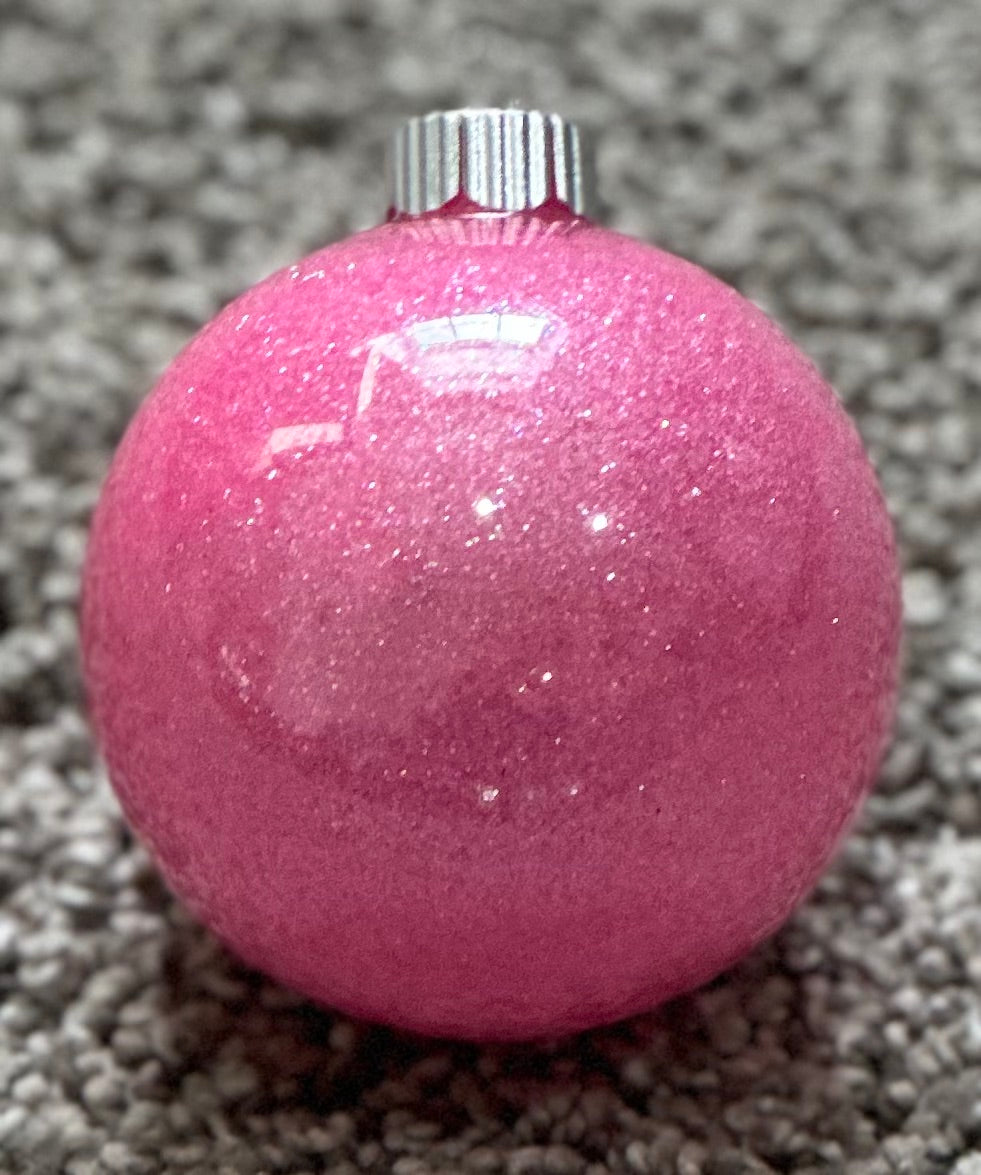 pink glittered plastic ornament