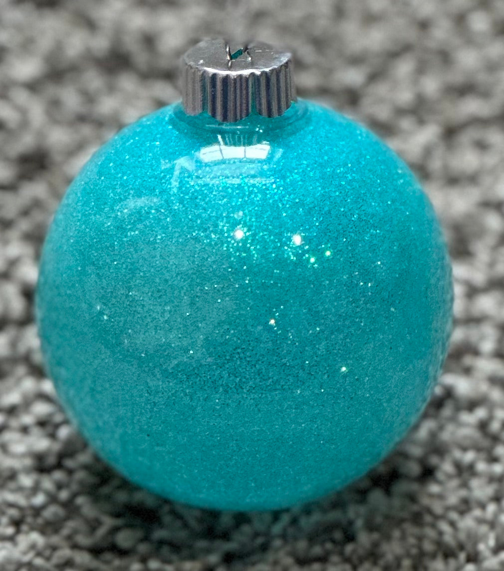 teal glittered plastic ornament