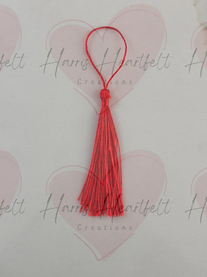 red metal bookmark tassel