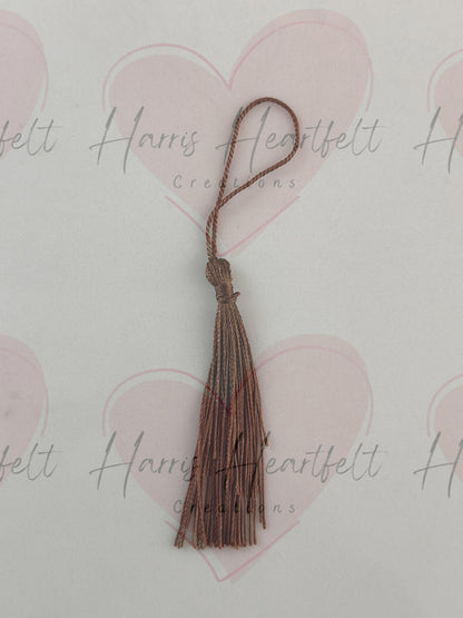brown metal bookmark tassel